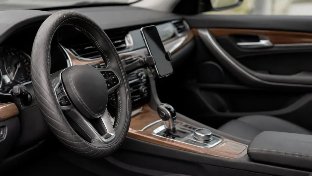Car interior showcasing removable accessories like a steering wheel cover.